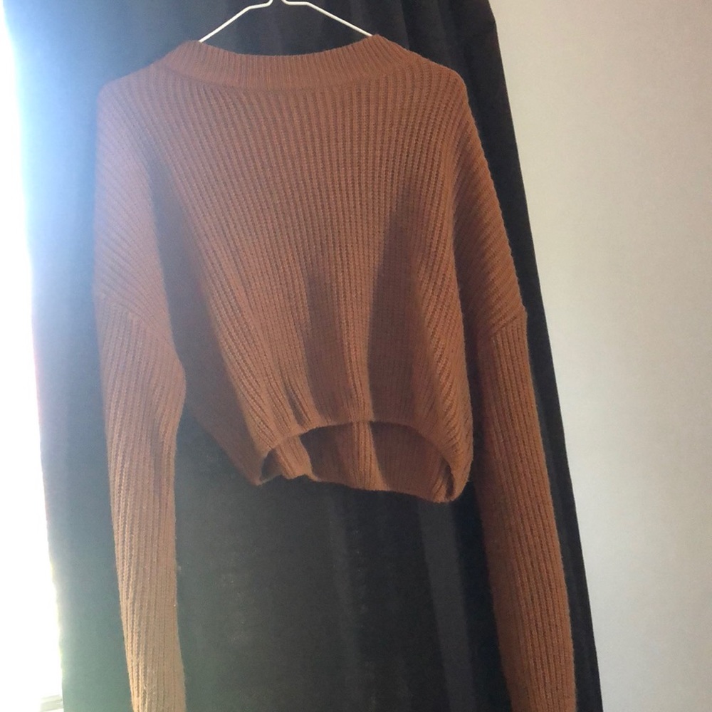 orange crop top sweater.